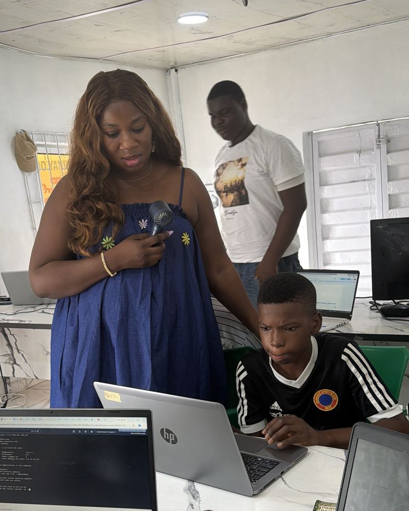 Flowealth learners working on a Cybersecurity project