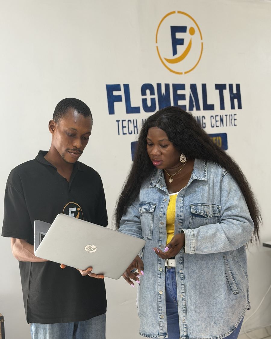 Flowealth Nikoro reviewing a project with a learner
