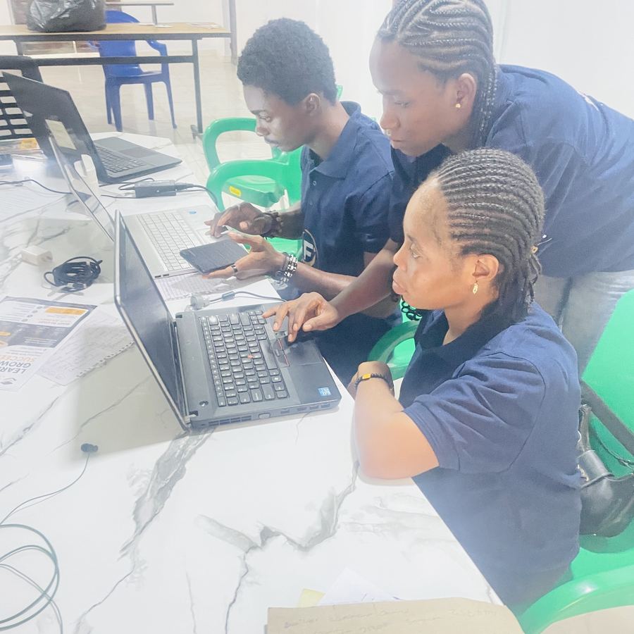 Learners working through a project together